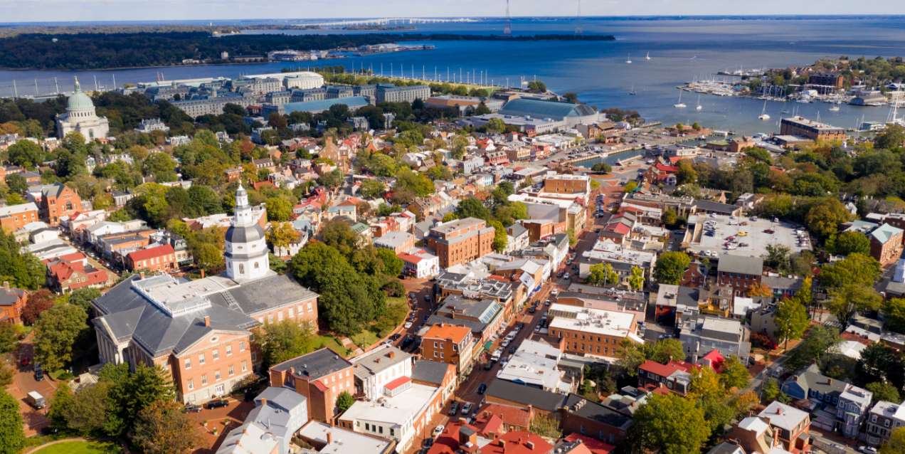 An aerial shot of a midsized city in Maryland by the ocean