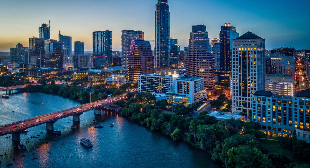 Downtown skyline of Austin, Texas, including Lady Bird Lake and the Congress Avenue Bridge